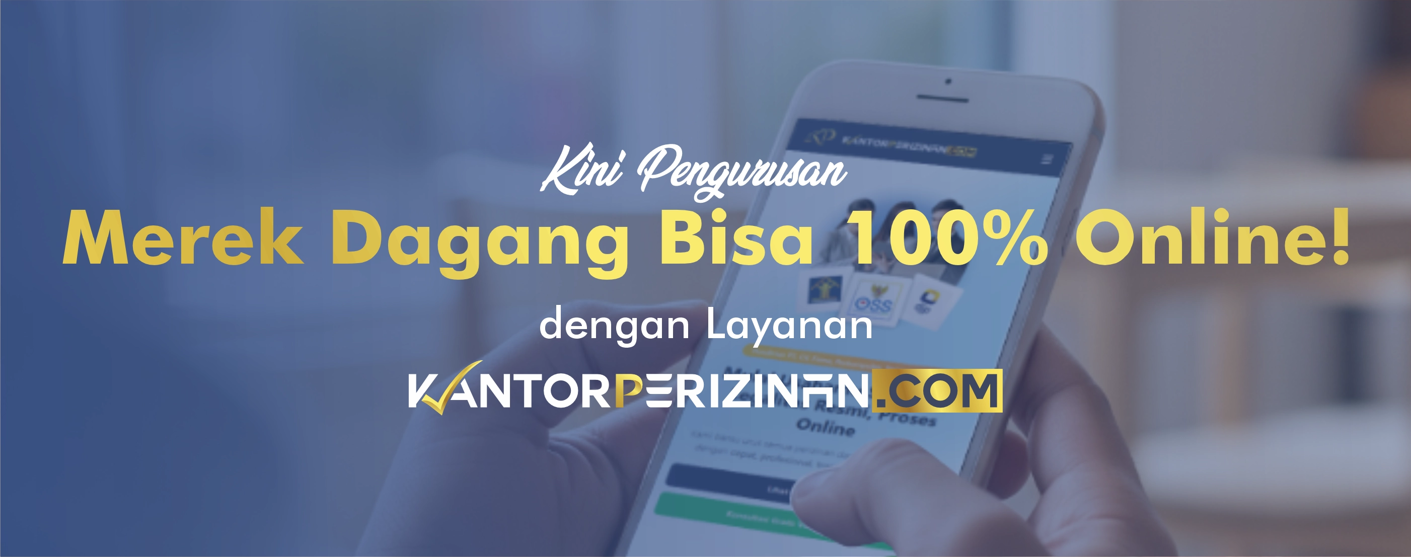 Hands holding documents and a phone on a wooden table